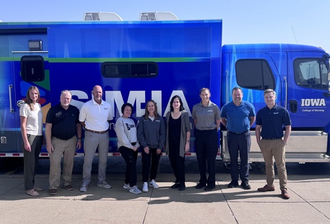 SIM-IA and Deery Brothers Ford staff stand in front of the SIM truck. 